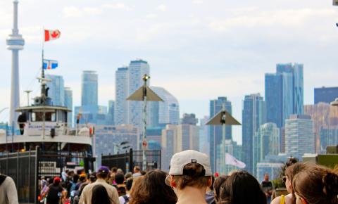 People returning back to the city by ferry from the Toronto Islands.