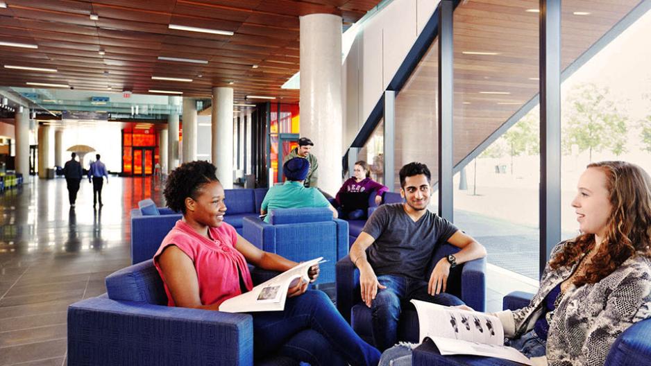 Students study together in a common area of the Waterfront campus.